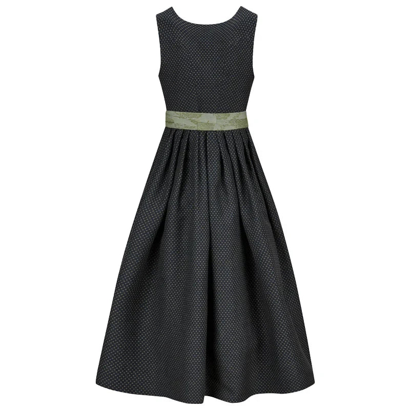 Black patterned dress with a green belt on a white background