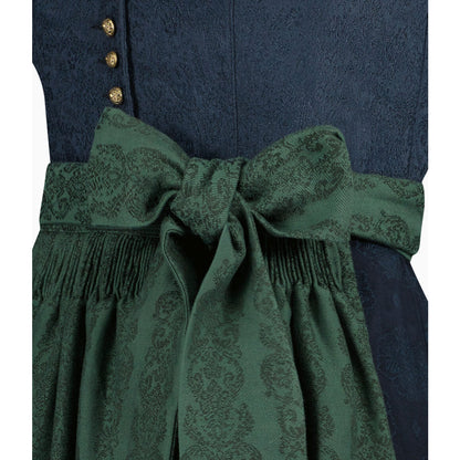 Green patterned belt tied around a navy blue garment with gold buttons.