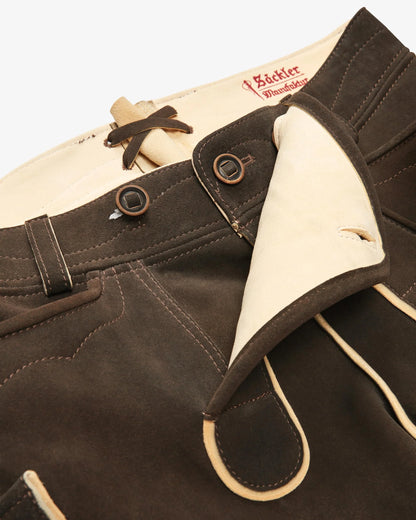 Brown and beige traditional German dirndl with visible brand name on a white background