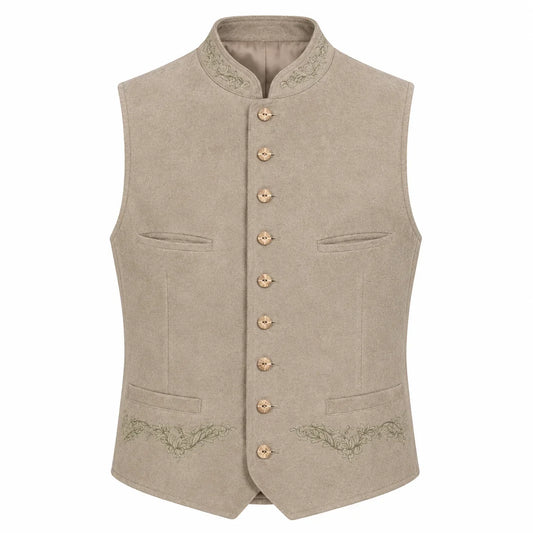 A light beige traditional German waistcoat (Mantel) with a mandarin collar, gold-tone buttons, and subtle green embroidery on the pockets and lower front, shown against a plain white background.