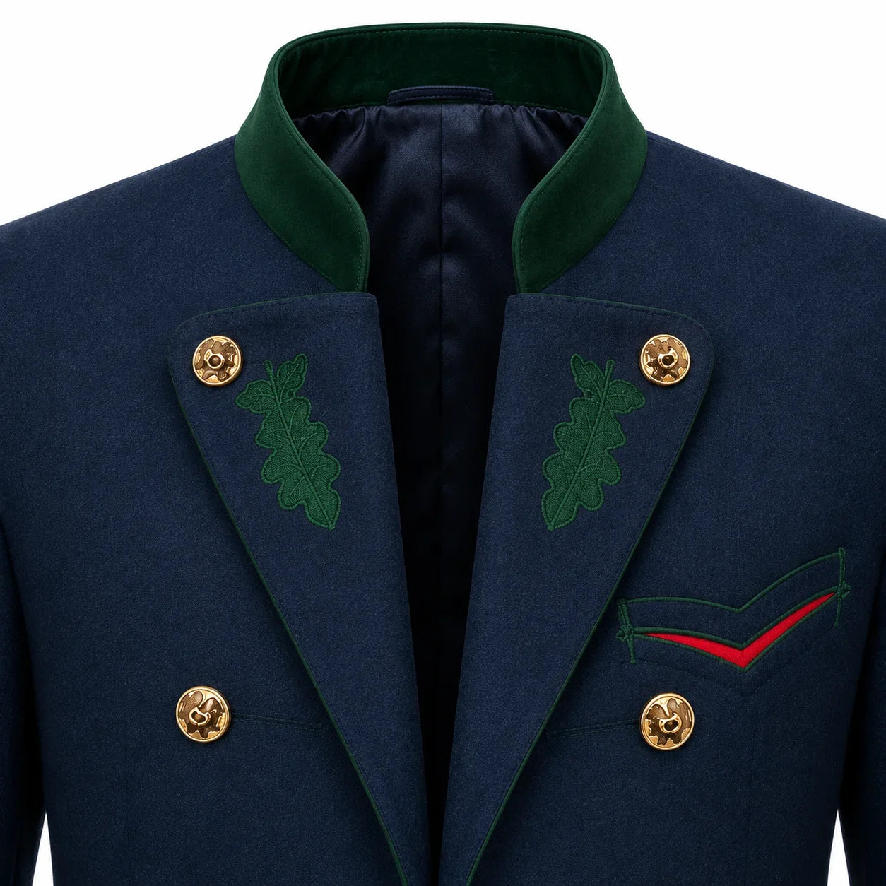 Close-up of a navy double-breasted blazer with a dark green peak collar, green embroidered oak leaf details on the lapels, gold buttons, and a red accent line on the chest pocket.