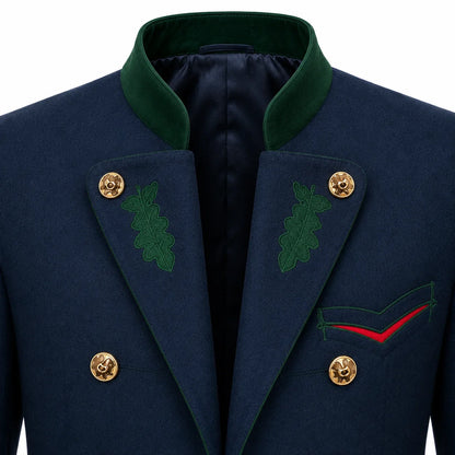 Close-up of a navy double-breasted blazer with a dark green peak collar, green embroidered oak leaf details on the lapels, gold buttons, and a red accent line on the chest pocket.