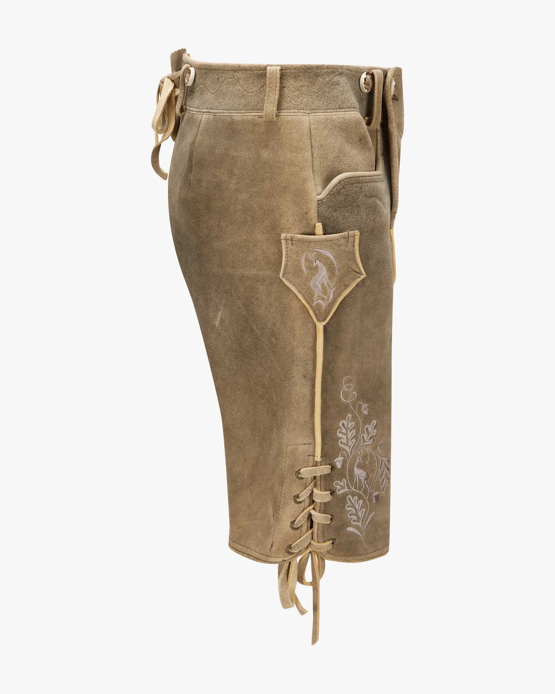 Brown traditional pants with lace-up front on a white background