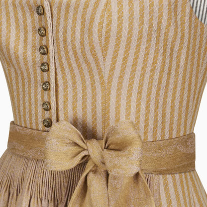 Close-up of a dress with a striped pattern and button details.