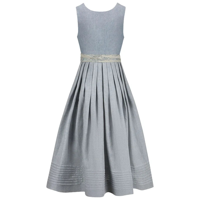 blue dirndl dress with a belt on a white background