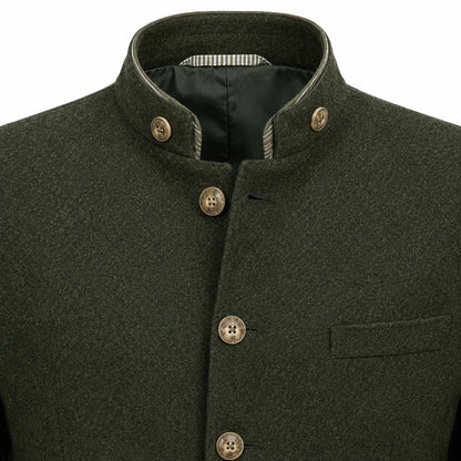 Close-up of a dark olive green wool jacket with a mandarin collar, brown buttons, and a striped inner lining.