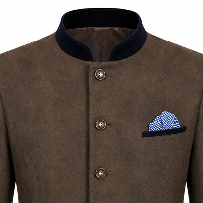 A close-up of a brown textured jacket with a dark navy stand collar, three front buttons, and a matching navy pocket square with a blue and white checkered pattern, shown on a white background.
