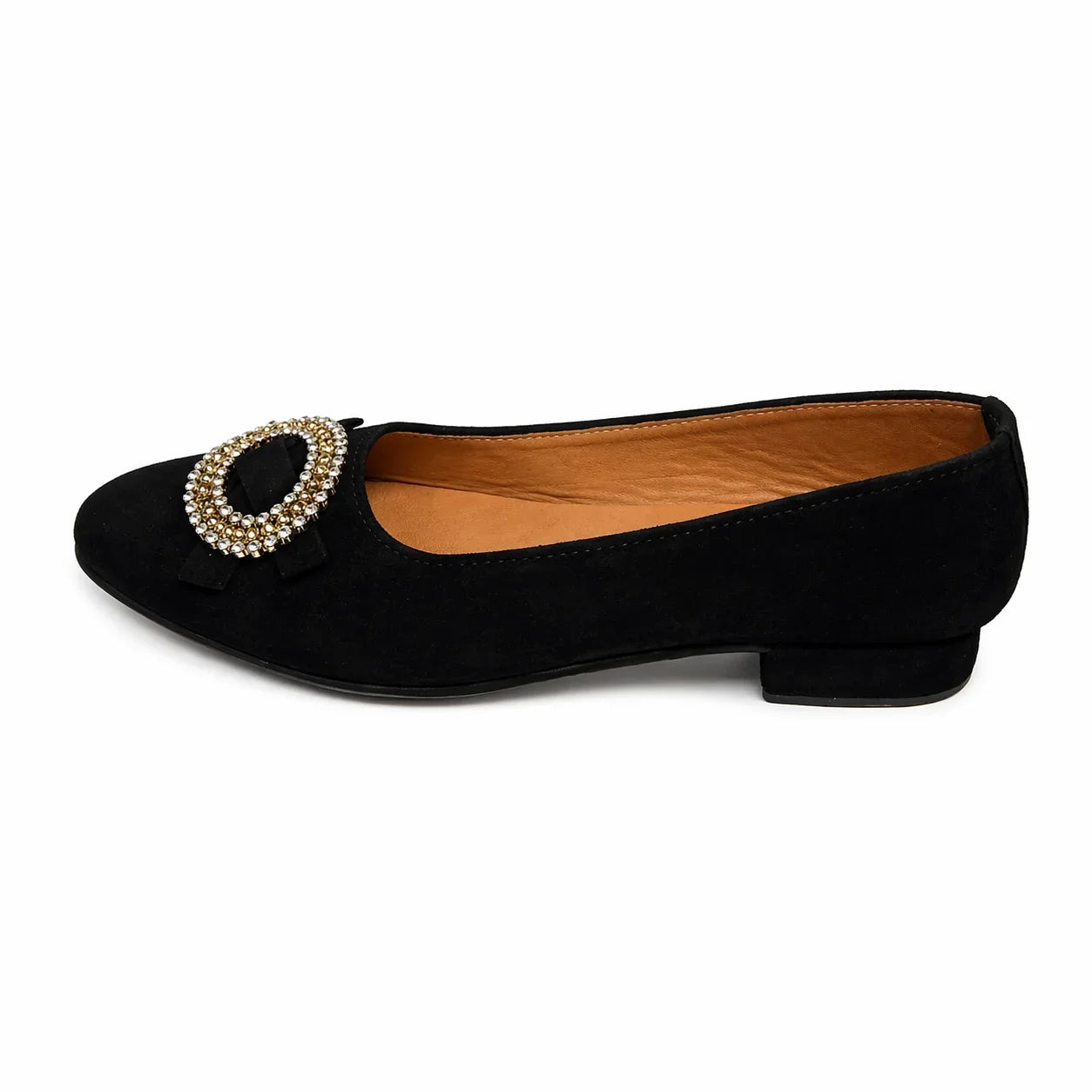 Black flat dirndl shoe with a decorative buckle on a white background