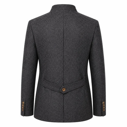 A dark gray textured wool-blend blazer shown from the back, featuring a single brown button at the waist and matching button details on the cuffs, set against a plain white background.
