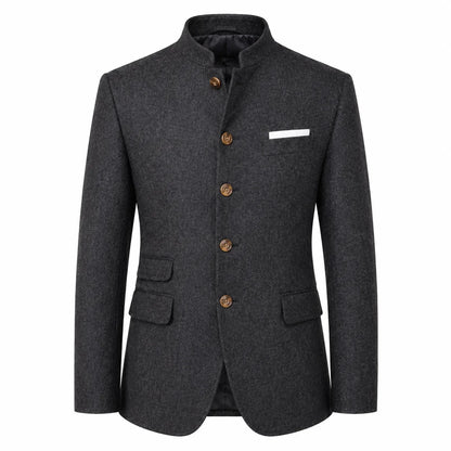 A dark gray textured wool-blend blazer with a mandarin collar, brown buttons, and a white pocket square, shown on a plain white background.
