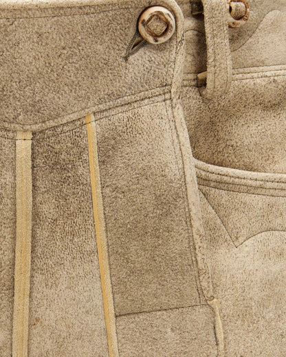 Close-up of beige fabric with stitching details
