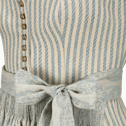 Close-up of a striped dress with a belt and buttons.