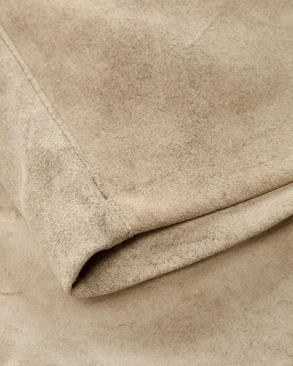 Close-up of beige fabric with a soft texture