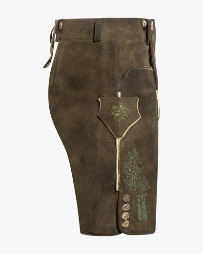 Brown leather pants with decorative elements on a white background