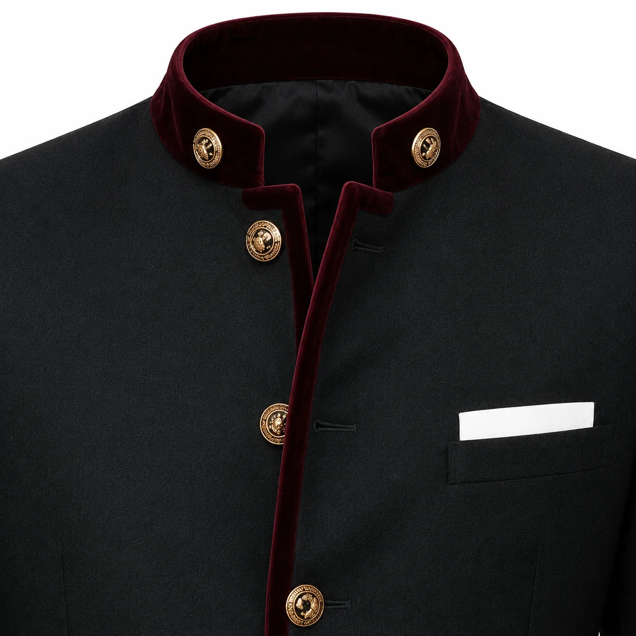 A close-up of a black traditional jacket with a contrasting deep red velvet collar and front trim, accented by gold-tone decorative buttons and a white pocket square.