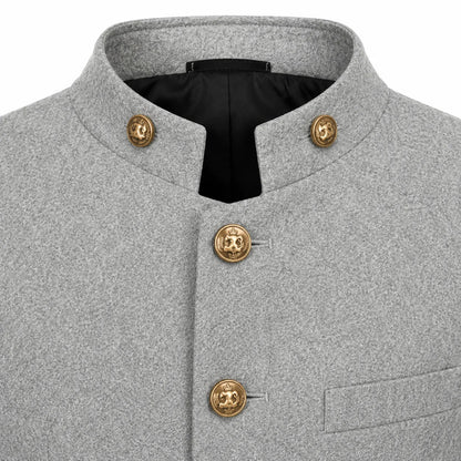 Close-up of a light gray textured jacket with a stand collar, black lining, and decorative gold-tone buttons on a white background.