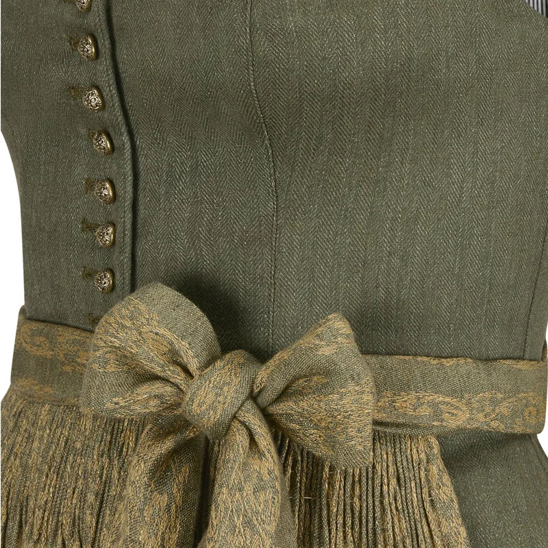 Green vest with a patterned belt and fringes