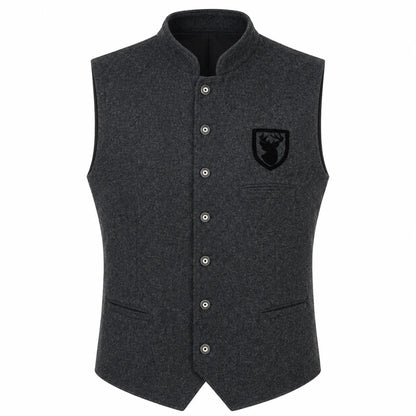 A dark gray heathered wool vest with a stand collar, button closure, and a black embroidered shield logo on the left chest, shown against a plain white background.