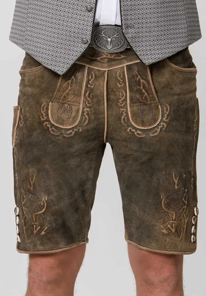 Brown leather shorts with intricate designs on a plain background