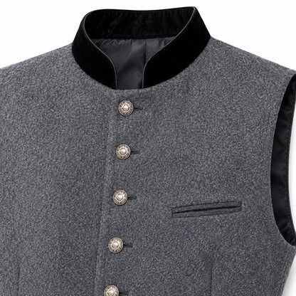 A close-up of a gray textured waistcoat vest with a black velvet collar and decorative silver-toned buttons, shown against a plain white background.