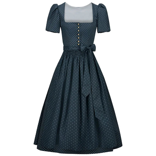 Navy polka dot dress with a white top on a white background