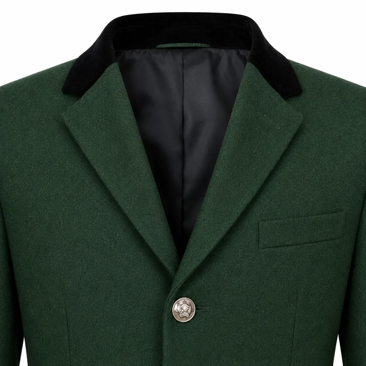Close-up of a dark green wool-blend blazer with a contrasting black velvet collar and a silver-toned button, shown on a white background.
