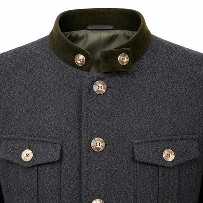 Close-up of a dark gray textured wool jacket with an olive green velvet collar and metallic buttons.