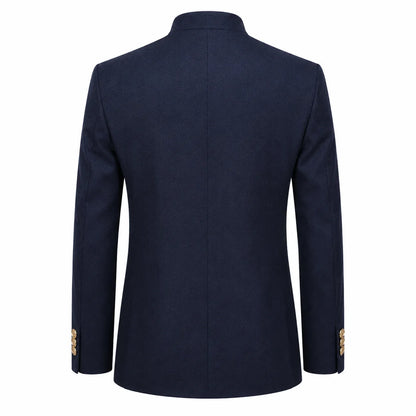 A navy blue blazer shown from the back, featuring a high collar and gold button accents on the cuffs, set against a plain white background.