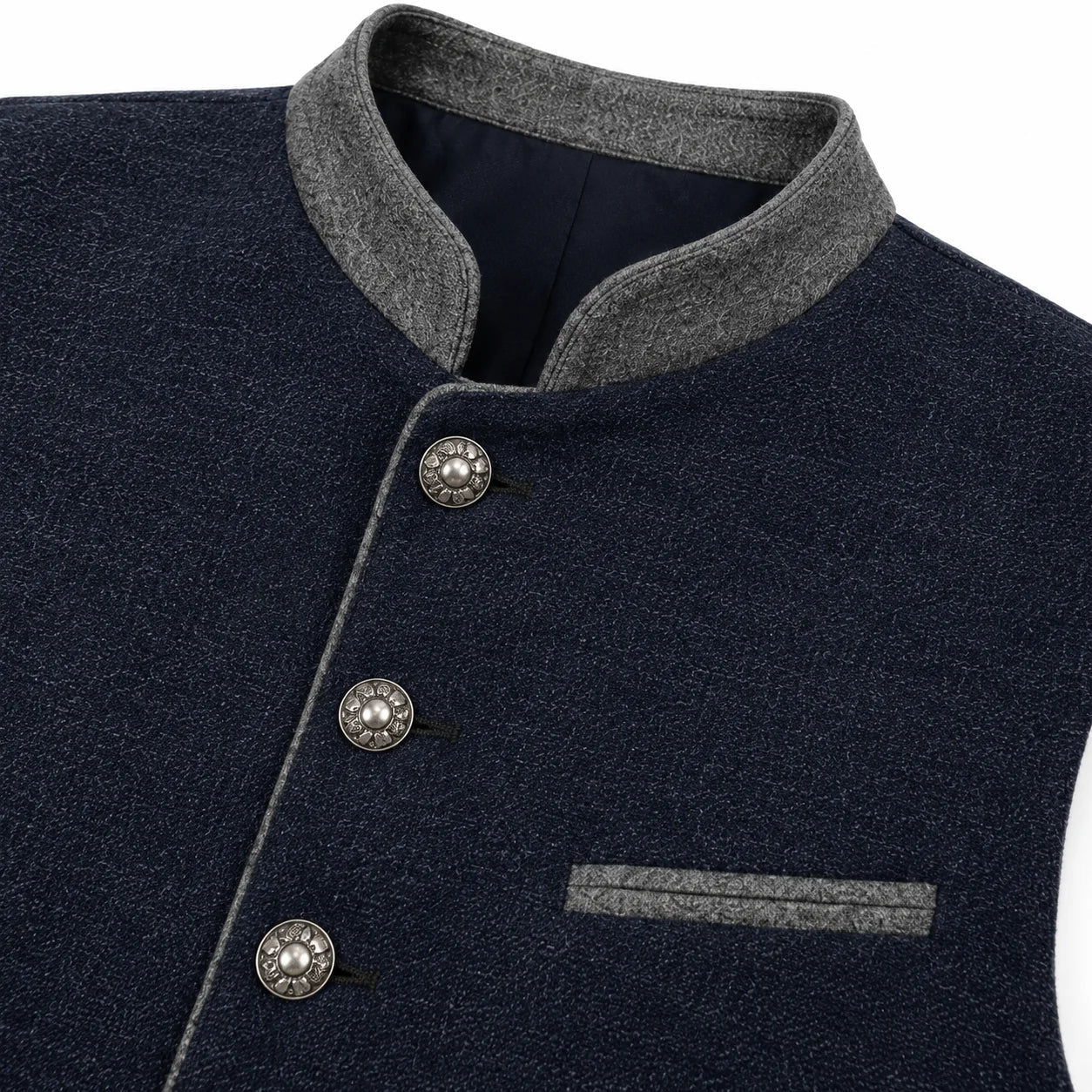 Close-up of a dark navy textured jacket with a gray mandarin collar, gray piping, and decorative silver buttons.