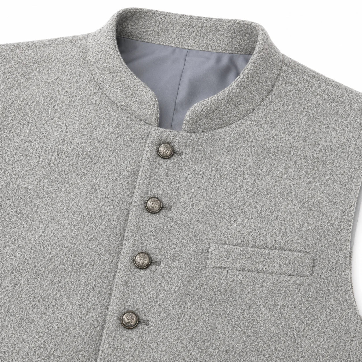 Close-up of a light gray textured waistcoat or vest with a mandarin collar, four front buttons, and a welt pocket on the chest.