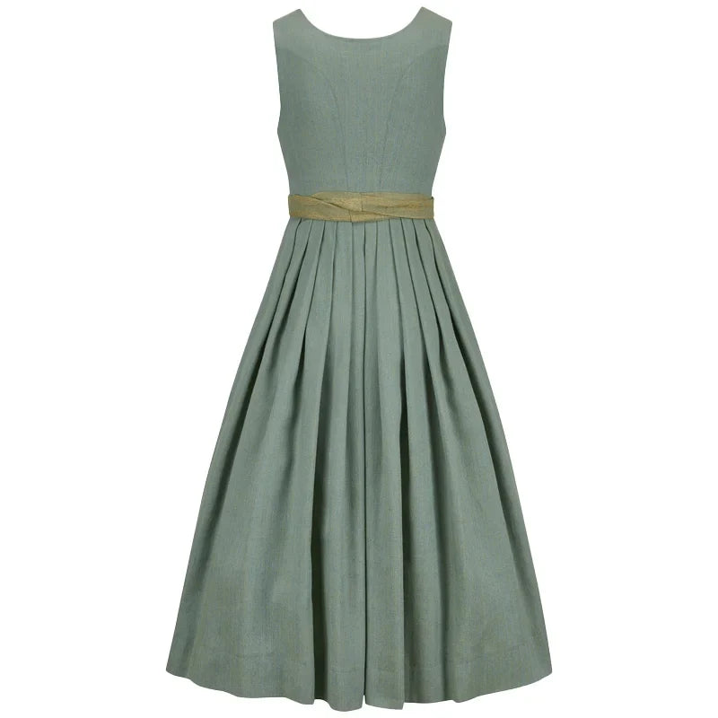 Green dress with a gold belt on a white background