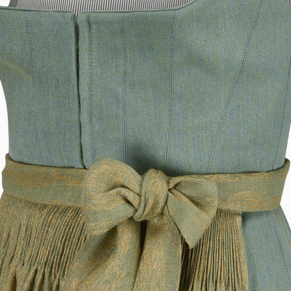 Green dress with a belt and fringes on a white background