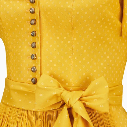 Yellow dress with a bow detail on a white background