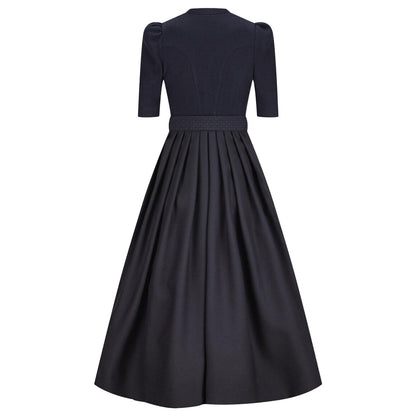 Black dress with a belt on a white background