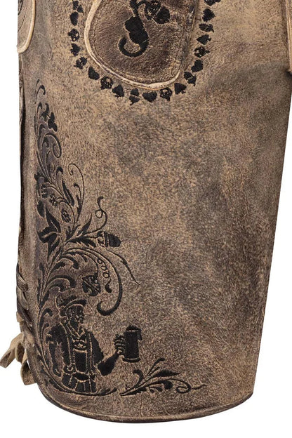 Brown leather bag with intricate black embossed designs on a white background