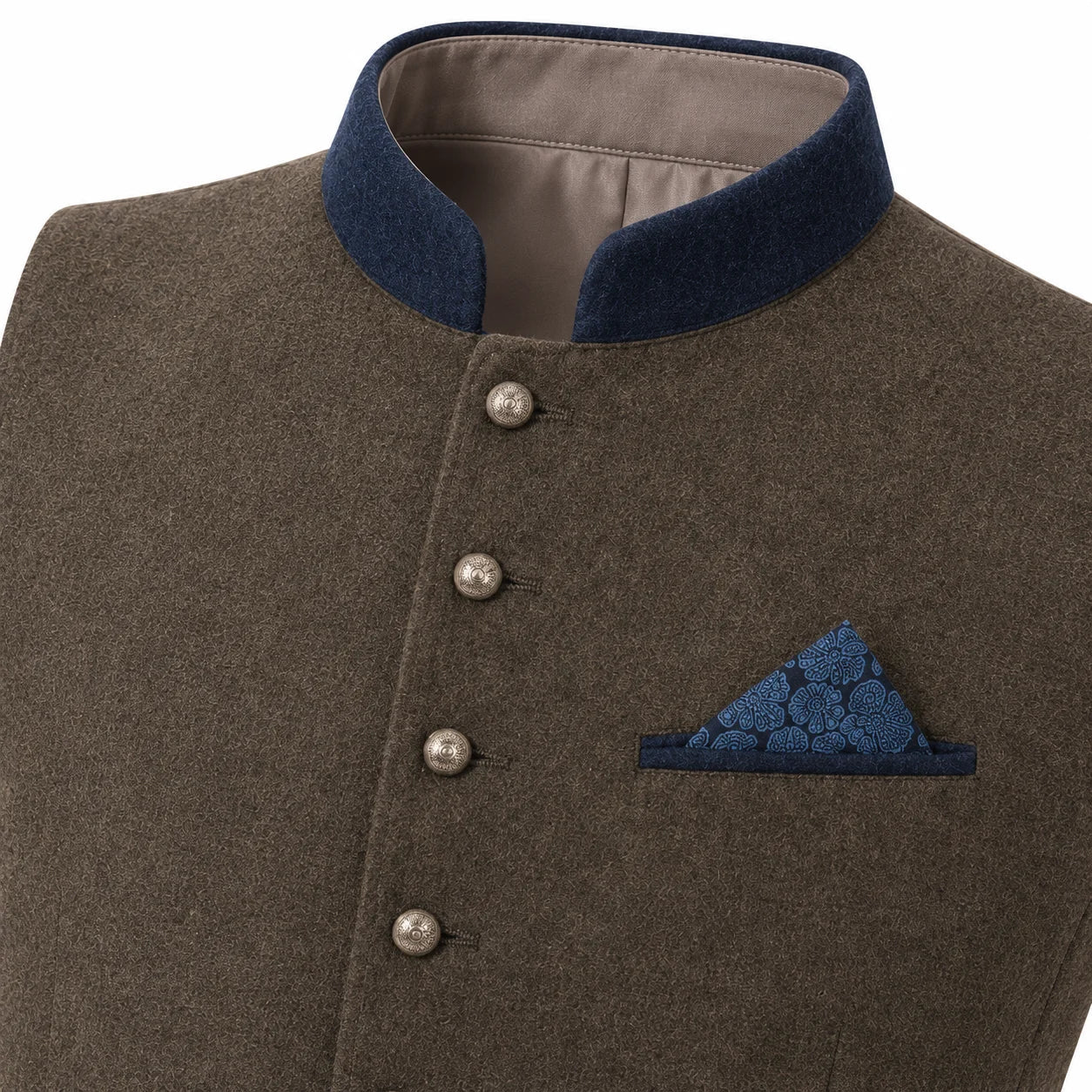 A close-up of a men's traditional-style jacket or waistcoat in textured brown fabric, featuring a dark navy blue mandarin collar, silver-tone front buttons, and a matching navy blue patterned pocket square.