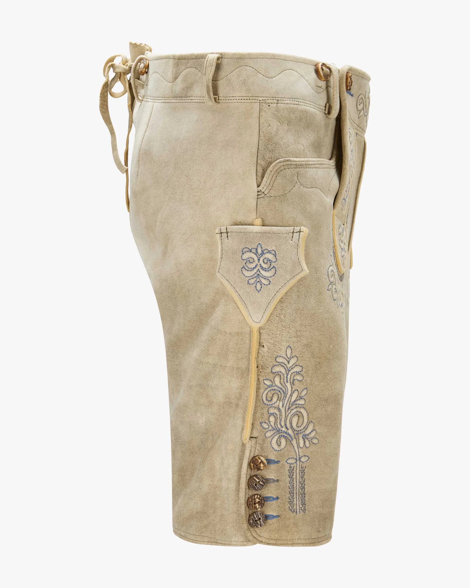 Beige traditional pants with embroidery on a white background