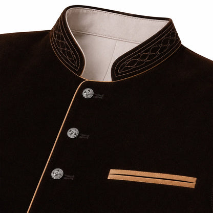 Close-up of a dark brown velvet jacket with a mandarin collar, silver buttons, and contrasting light brown piping details.