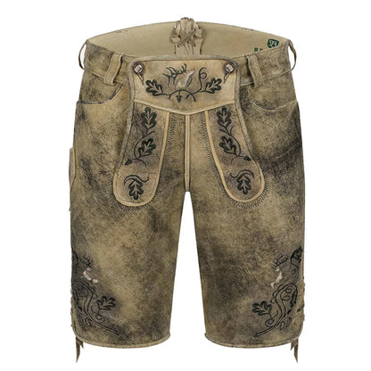Traditional German lederhosen with embroidery on a white background