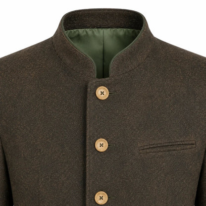 Close-up of a dark brown wool jacket with a mandarin collar, three tan buttons, and a green lining visible inside the collar.