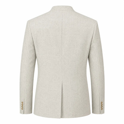 The back view of a light beige textured blazer with a center seam and gold button accents on the cuffs, shown on a plain white background.