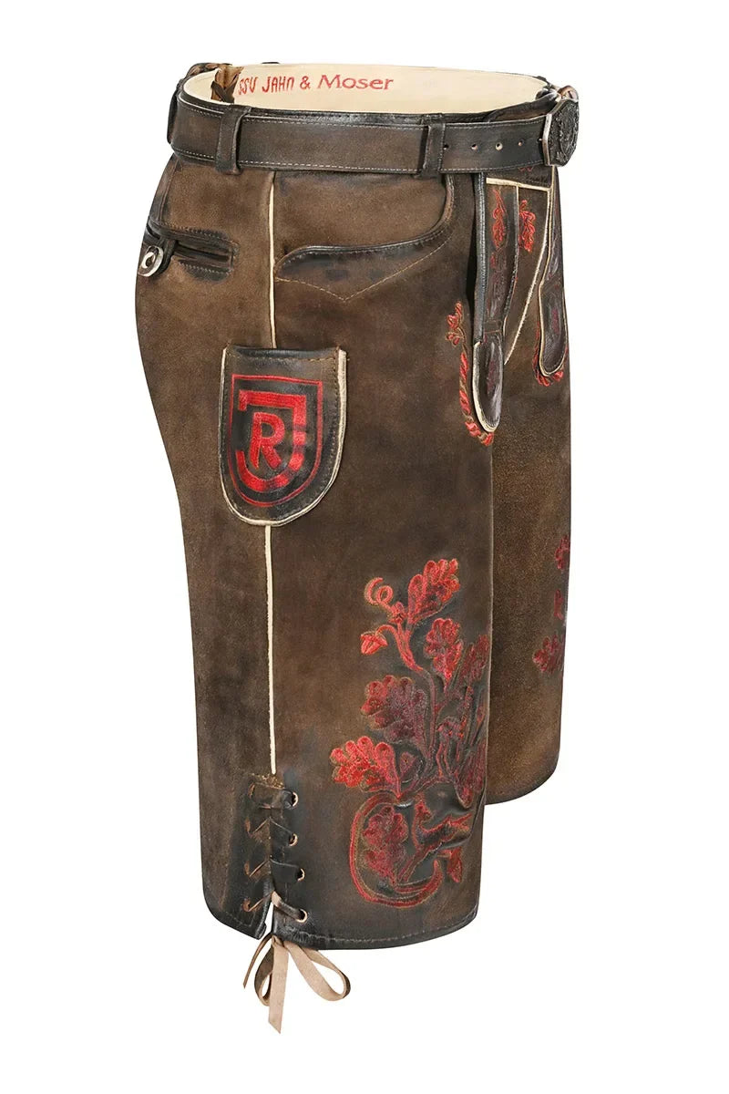Brown leather chaps with floral embroidery and brand logo on a white background