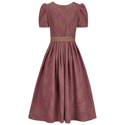 Dirndl dress with puff sleeves on a white background