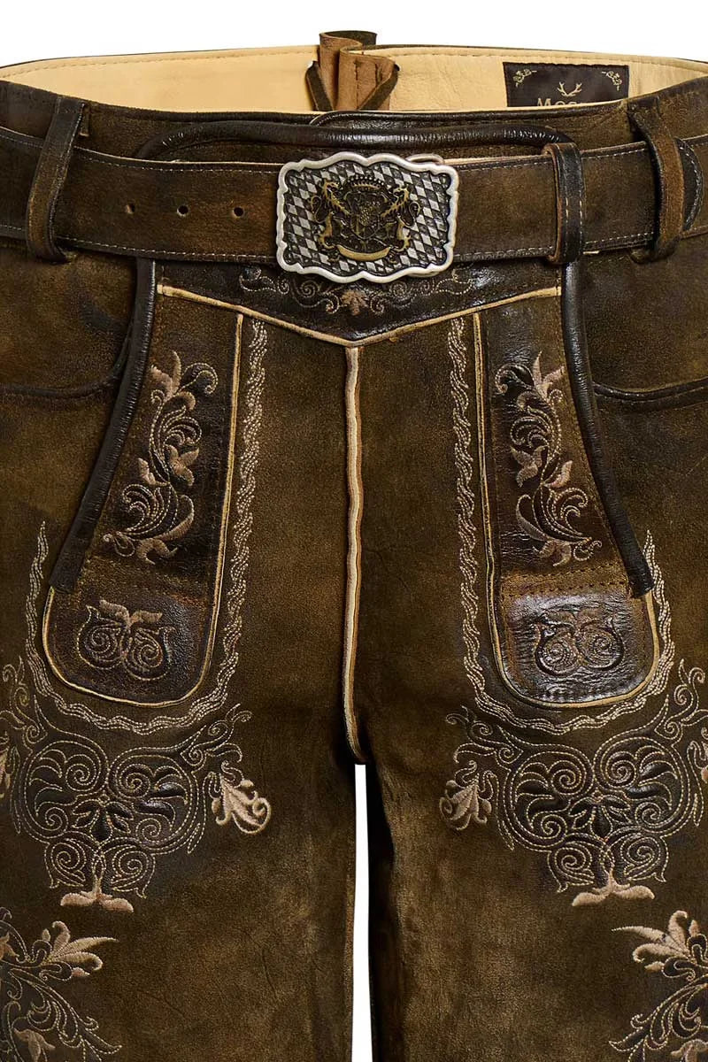 Brown leather pants with intricate embroidery and a decorative belt buckle.