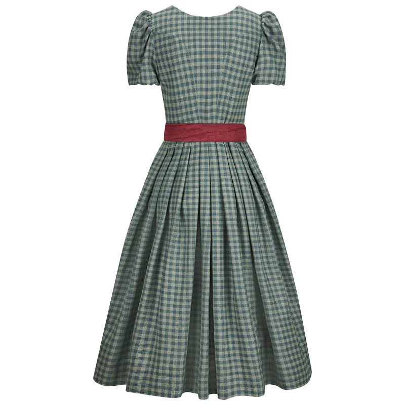 Green checkered dress with a red belt on a white background