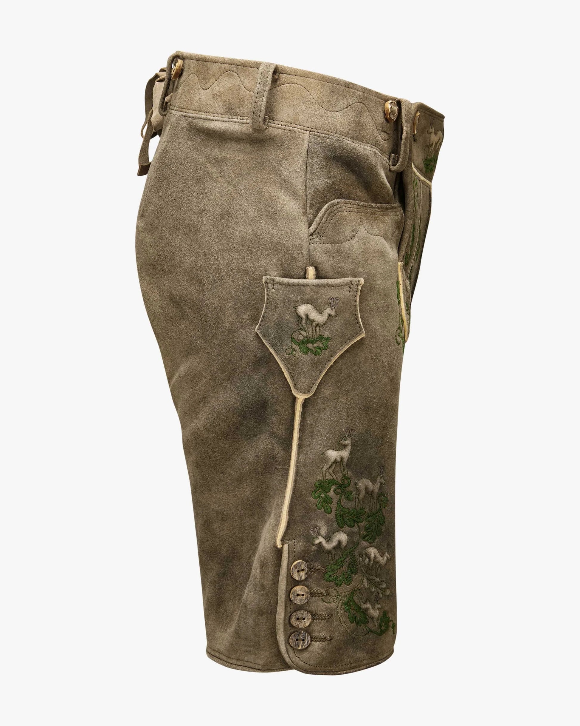Brown leather pants with embroidered designs on a white background