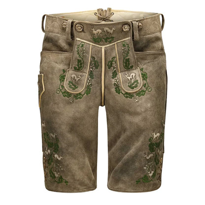 Traditional German lederhosen with embroidery on a white background
