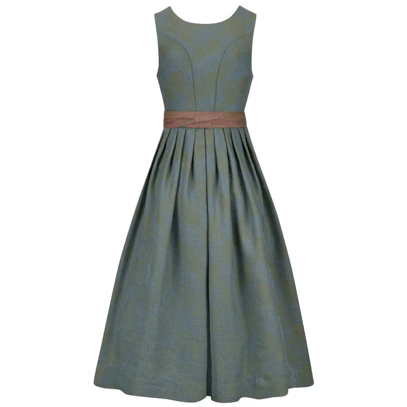 Green patterned dress with a pink belt on a white background
