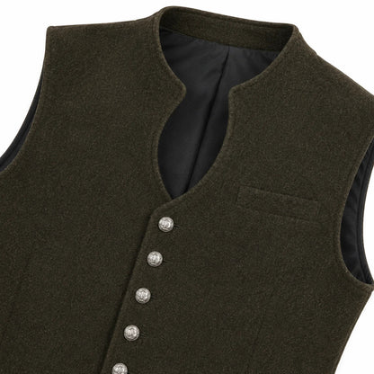 Close-up of an olive green wool vest with a mandarin collar, silver decorative buttons, and a black lining.