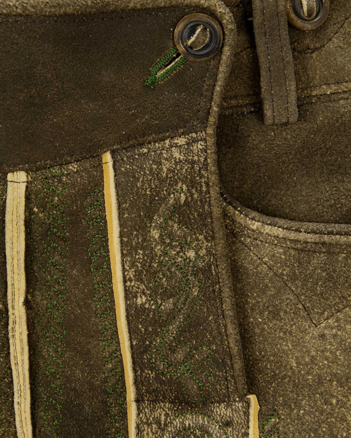 Close-up of a brown leather boot with stitching details